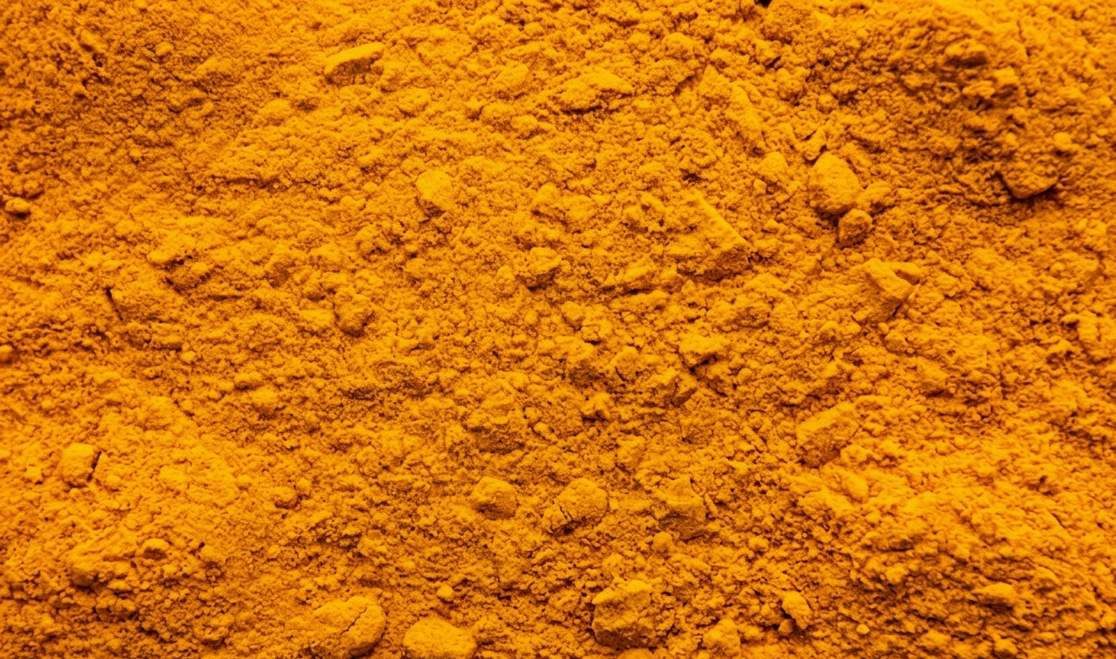 Turmeric Powder Close Up Fine Texture